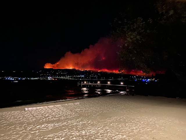 Wildfire in mountains of West Kelowna at night